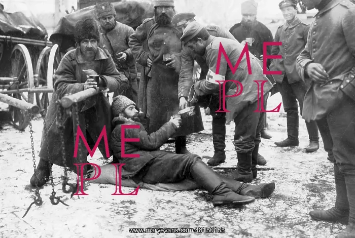 : German medic cares for a wounded Russian, 1915 : German medic cares for a wounded Russian, 1915
