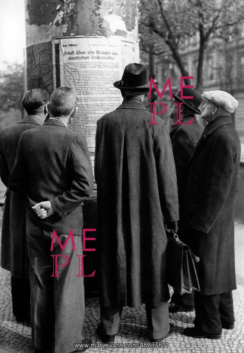 : German men read the regulation on the formation of the : German men read the regulation on the formation of the