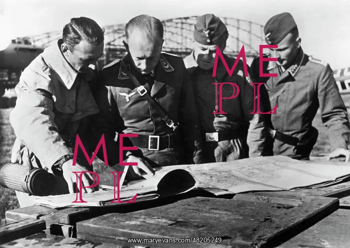 : German pilots at a briefing : German pilots at a briefing