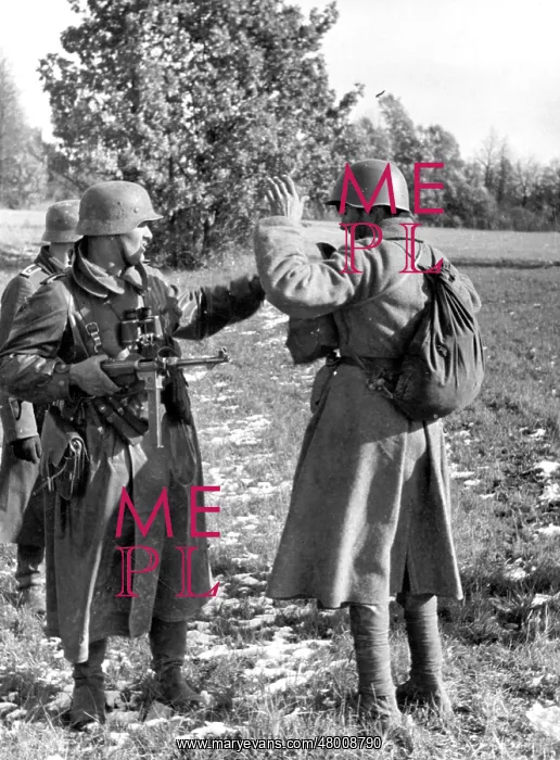 : German soldier captures a Russian infantry, 1941 : German soldier captures a Russian infantry, 1941