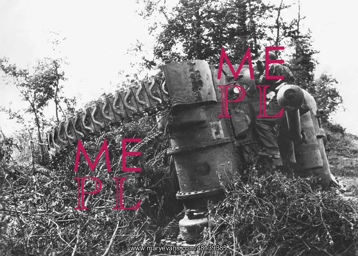 : German soldier by a destroyed Sherman, 1944 : German soldier by a destroyed Sherman, 1944