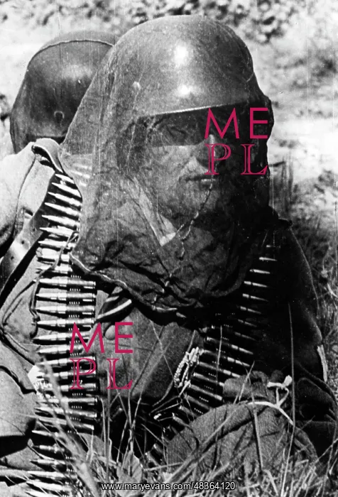 : German soldier with a mosquito net, 1942 : German soldier with a mosquito net, 1942