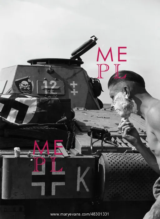 : German soldier shaving, 1941 : German soldier shaving, 1941
