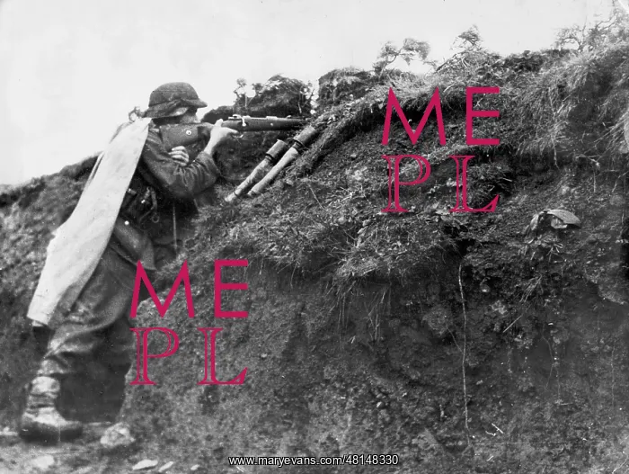 : German soldier in a trench position, 1944 : German soldier in a trench position, 1944