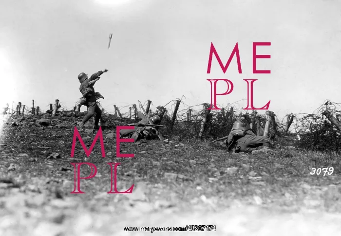 : German soldiers in front of a barbed wire obstacle during th : German soldiers in front of a barbed wire obstacle during th