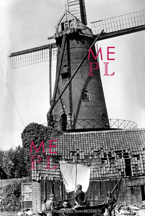 : German soldiers in front of a mill in Belgium, May 1940 : German soldiers in front of a mill in Belgium, May 1940
