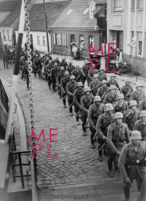 : German soldiers marching through the town of Storkow : German soldiers marching through the town of Storkow