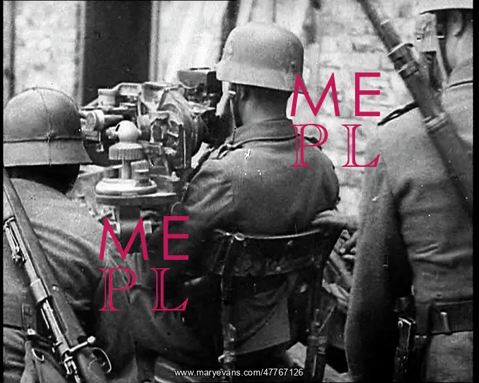 : German Soldiers Operating A Gun Placement In : German Soldiers Operating A Gun Placement In
