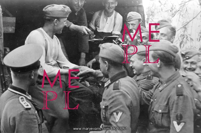 : German soldiers receive ammunition before the attack on the : German soldiers receive ammunition before the attack on the