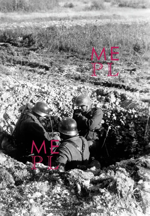: German soldiers in a shell crater, 1942 : German soldiers in a shell crater, 1942