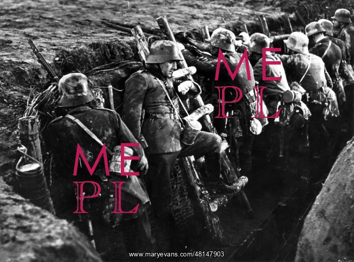 : German soldiers wait in a trench for the order to attack, 19 : German soldiers wait in a trench for the order to attack, 19