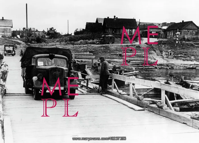 : German troops pass a temporary bridge in Orsha, 1941 : German troops pass a temporary bridge in Orsha, 1941