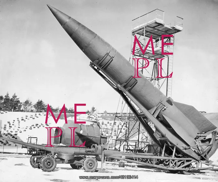 : German V-2 missile is raised up in preparation for take off : German V-2 missile is raised up in preparation for take off
