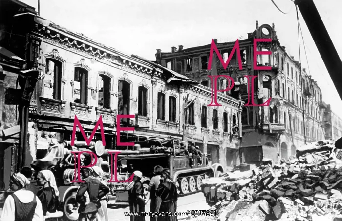 : German vehicles pass Minsk, 1941 : German vehicles pass Minsk, 1941