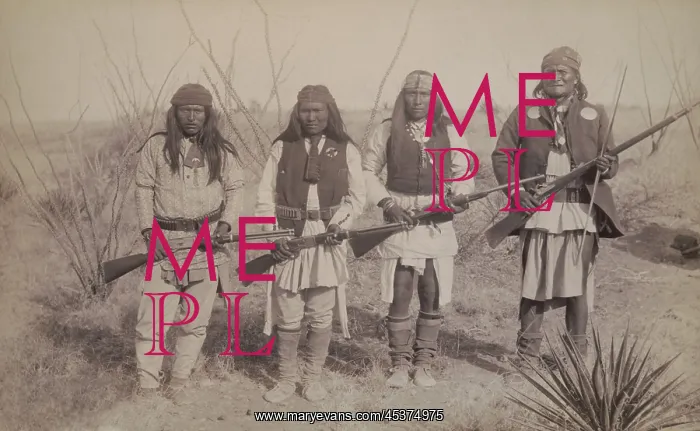 : Geronimo, standing on the right, holding a : Geronimo, standing on the right, holding a