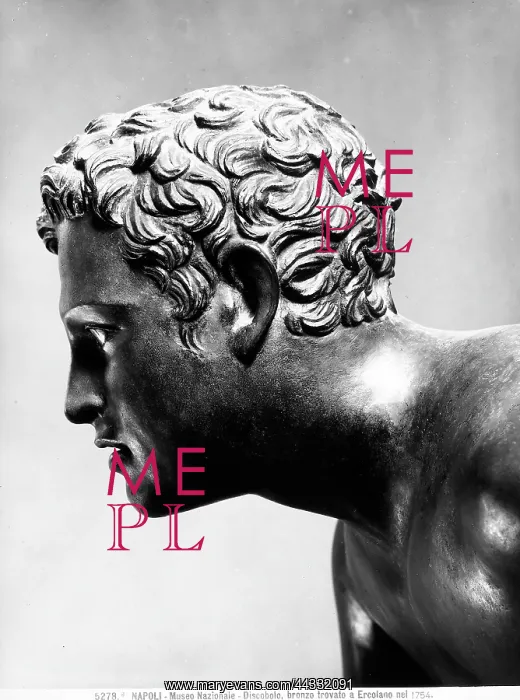 : The gilded bronze face of : The gilded bronze face of
