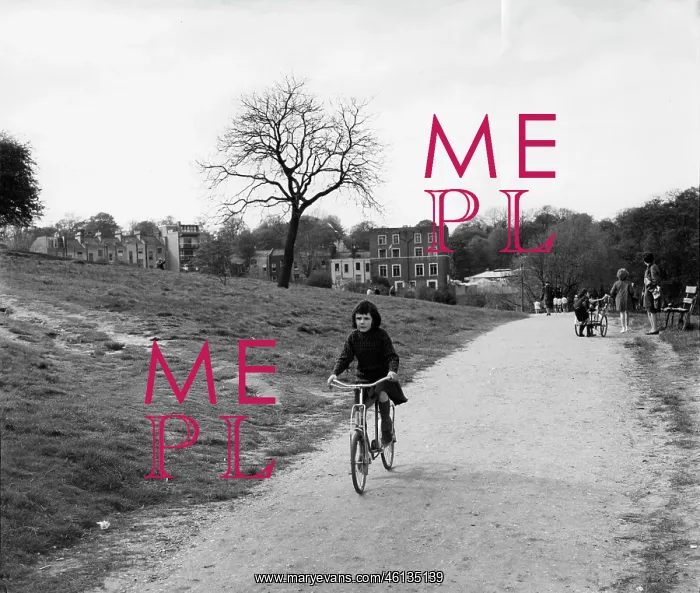 : Girl on a bicycle in a park : Girl on a bicycle in a park