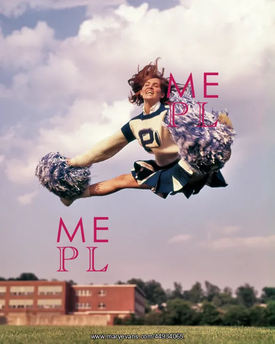 : Girl Cheerleader in Mid Air Split Jump : Girl Cheerleader in Mid Air Split Jump