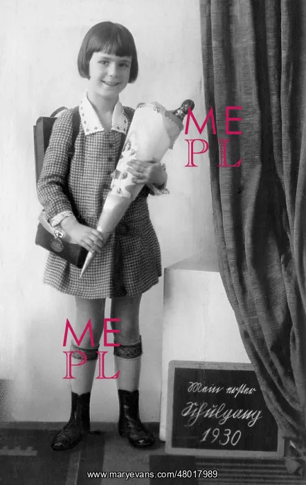 : Girl with cone of candy, a custom on the first day of school : Girl with cone of candy, a custom on the first day of school