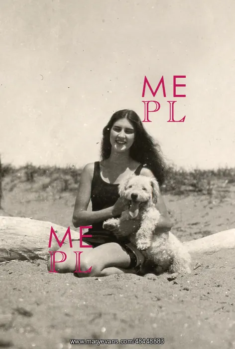  : Girl and dog on a beach