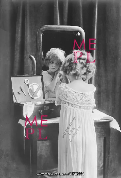  : Girl dressing up in front of mirror