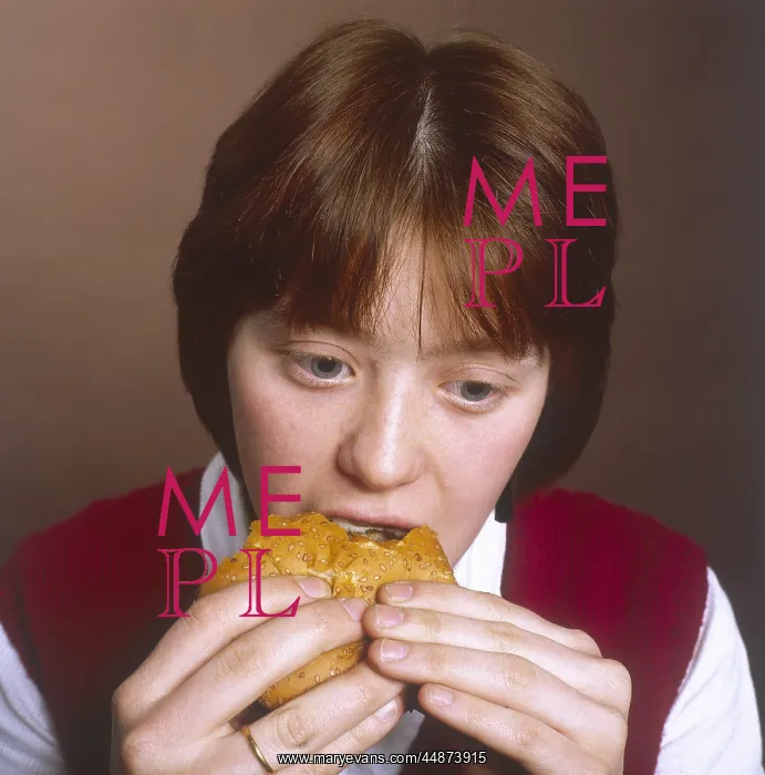  : GIRL EATING A HAMBURGER