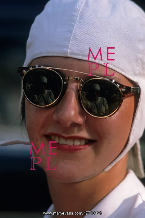 : Girl with goggles and white helmet. Vertical format : Girl with goggles and white helmet. Vertical format