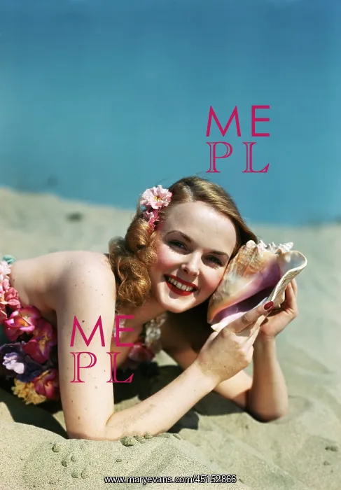 : Girl Lying On Beach With Conch Shell : Girl Lying On Beach With Conch Shell