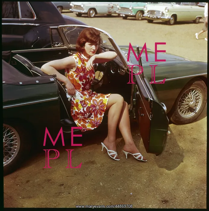 : GIRL IN MGB 1960S : GIRL IN MGB 1960S