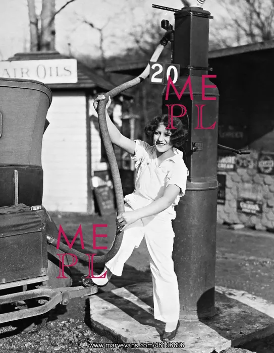 : A girl while refueling, 1932 : A girl while refueling, 1932