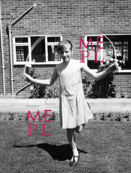 : GIRL SKIPS IN GARDEN : GIRL SKIPS IN GARDEN
