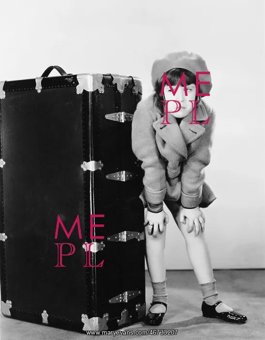 : Girl standing next to suitcase : Girl standing next to suitcase