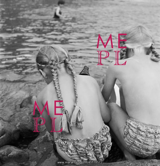 : Two girls. View from behind of two girls with plaited hair wearing swimwear : Two girls. View from behind of two girls with plaited hair wearing swimwear
