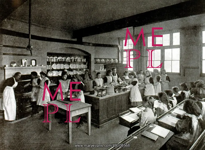 : Girls in a classroom having a cookery lesson : Girls in a classroom having a cookery lesson
