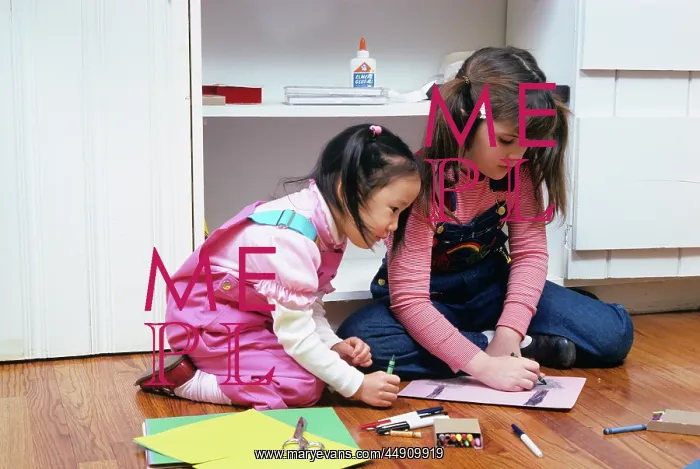  : Two Girls Coloring On Floor