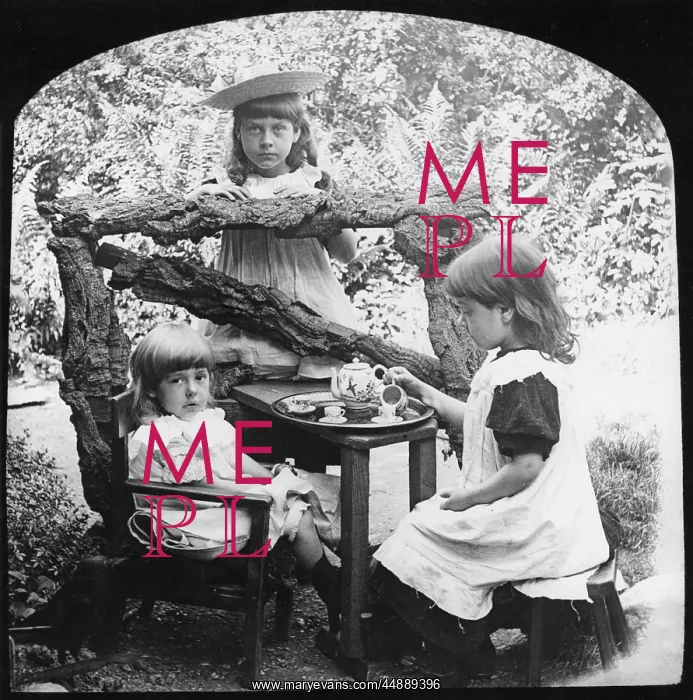 : Three girls having a tea party : Three girls having a tea party