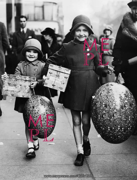  : Two girls with huge Easter eggs