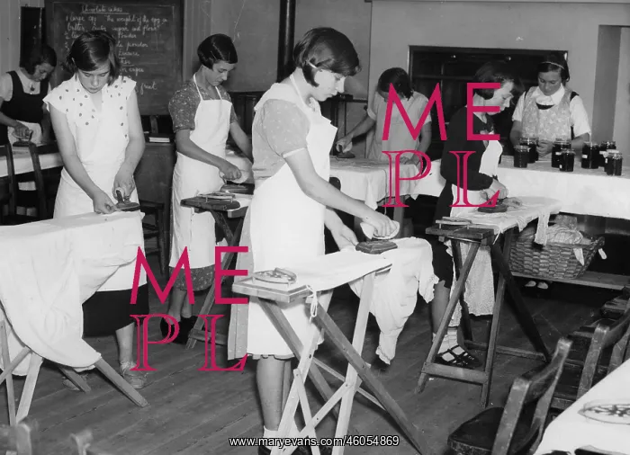 : Girls ironing : Girls ironing