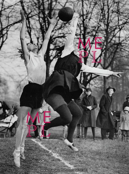 : Two girls during a netball game at : Two girls during a netball game at