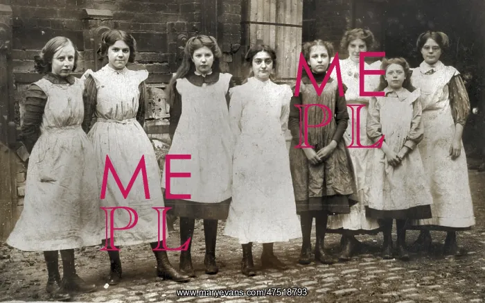 : Girls outside a (clothes-making?) workshop : Girls outside a (clothes-making?) workshop