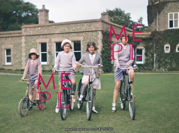 : Four girls riding bicycles : Four girls riding bicycles