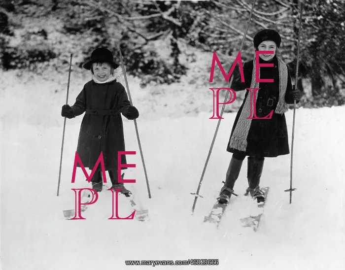: Two girls skiing : Two girls skiing