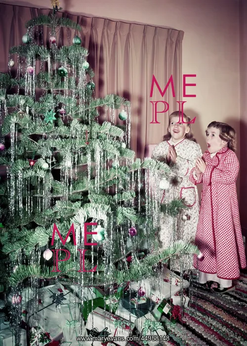 : Two Girls Standing in Front of Christmas Tree : Two Girls Standing in Front of Christmas Tree