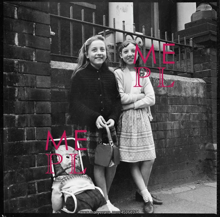 : Two girls standing in front of Hill Top Methodist : Two girls standing in front of Hill Top Methodist
