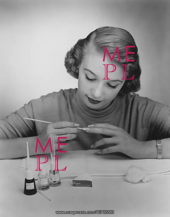 : Giving herself a manicure : Giving herself a manicure