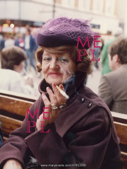 : Glamorous elderly lady smoking : Glamorous elderly lady smoking
