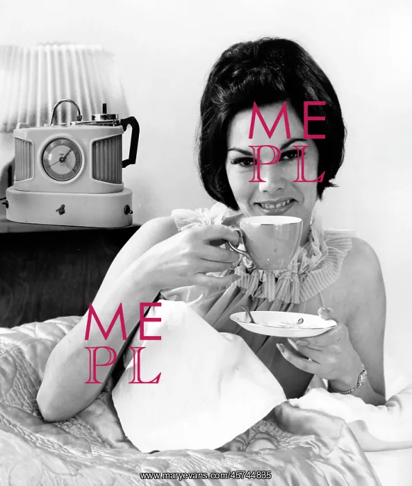 : A glamorous female model with her trusty Goblin Teasmade : A glamorous female model with her trusty Goblin Teasmade