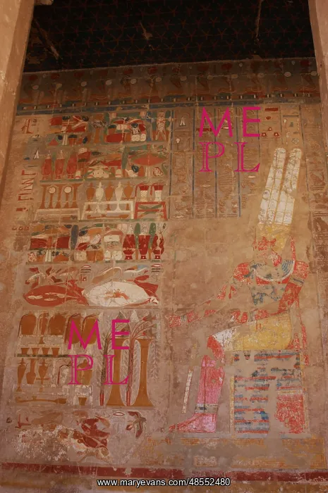 : The god Amon, sitting at a table of offerings. Temple of Hat : The god Amon, sitting at a table of offerings. Temple of Hat