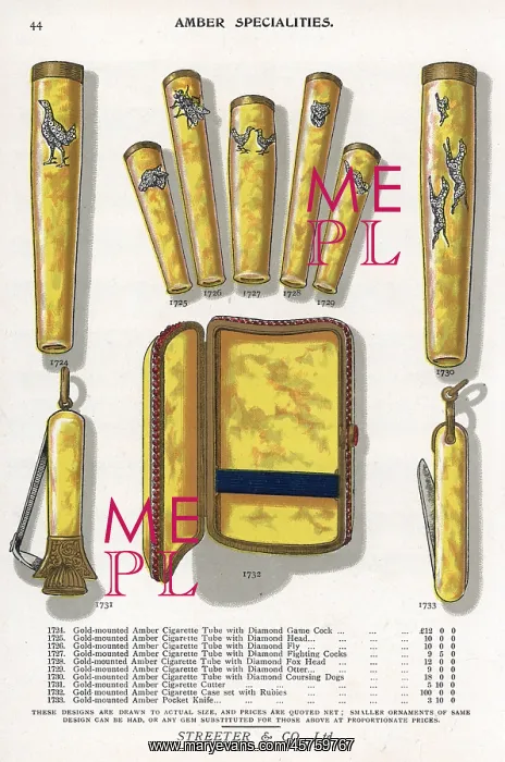 : Gold mounted amber jewelry including cigarette : Gold mounted amber jewelry including cigarette