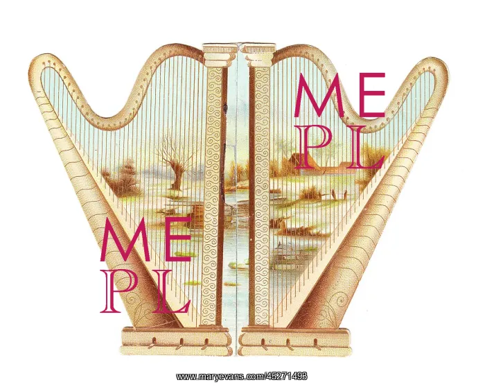 : Two golden harps on a cutout greetings card : Two golden harps on a cutout greetings card
